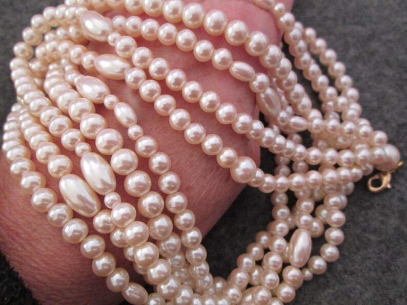 Beautiful 5 Strand Set of PEARLS Various ShapesPearls, Pearl necklace,Lustrous Pearls, Vintage 1960's, new old stock image 5