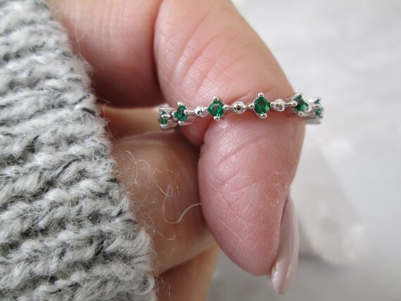 Thin emerald eternity band sale
