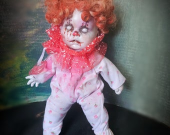 Mini baby zombie clown doll