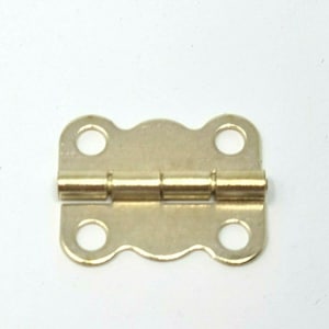 May include: A gold-toned metal hinge with four holes and a decorative scalloped edge.