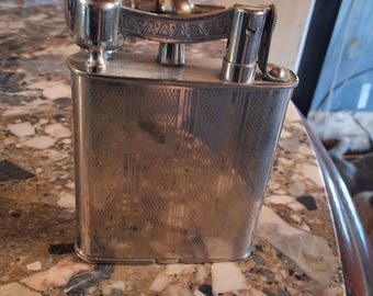 Raised arm reliance cable lighter made an occupied japan