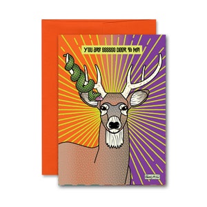 Un serpent sifflant enveloppe des bois de cerf pour montrer à quel point une personne vous est chère Carte de vœux
