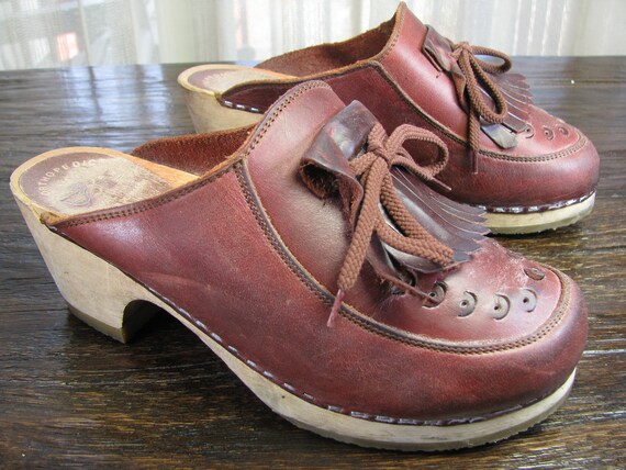 Wooden and Red Leather Clogs From 
