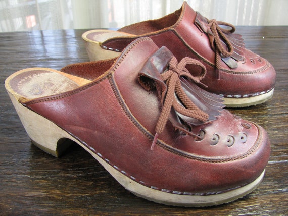 red leather clogs