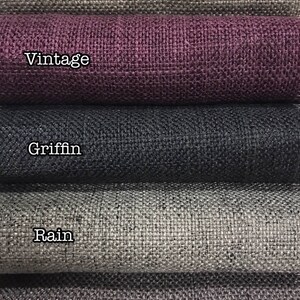 May include: Five fabric swatches in different colors and textures. The swatches are labeled "Weathered", "Vintage", "Griffin", "Rain", and "Poised".