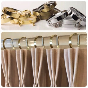 Anneaux décoratifs plats et réguliers avec insert en plastique pour tringle à rideaux de 1 1/8 ". (prix par 10 pièces) Quincaillerie de draperie.