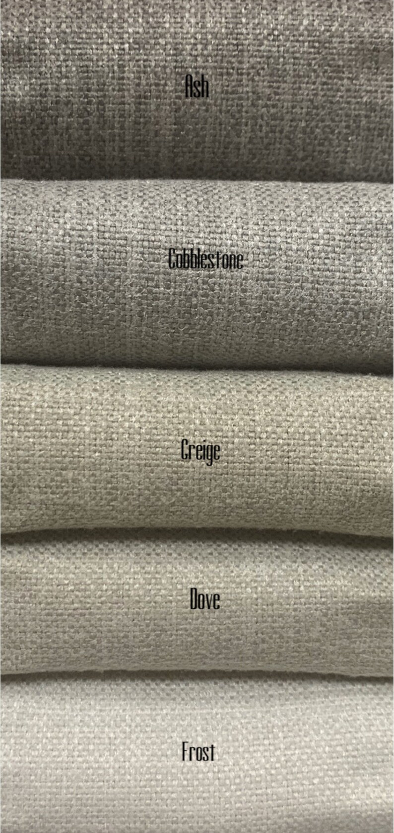 May include: Five fabric swatches in different shades of gray, from dark to light. The swatches are labeled "Ash", "Cobblestone", "Creige", "Dove", and "Frost".