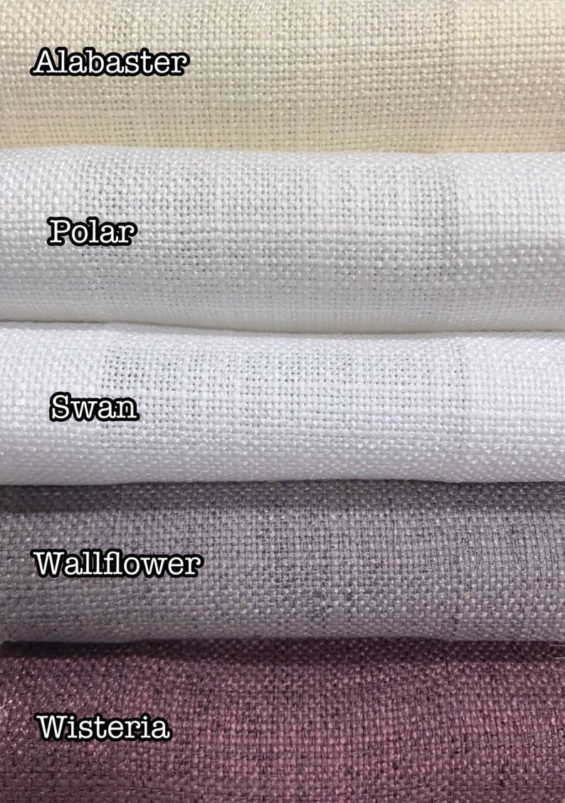 May include: Five fabric swatches in different colors and textures. The swatches are labeled "Alabaster", "Polar", "Swan", "Wallflower", and "Wisteria".