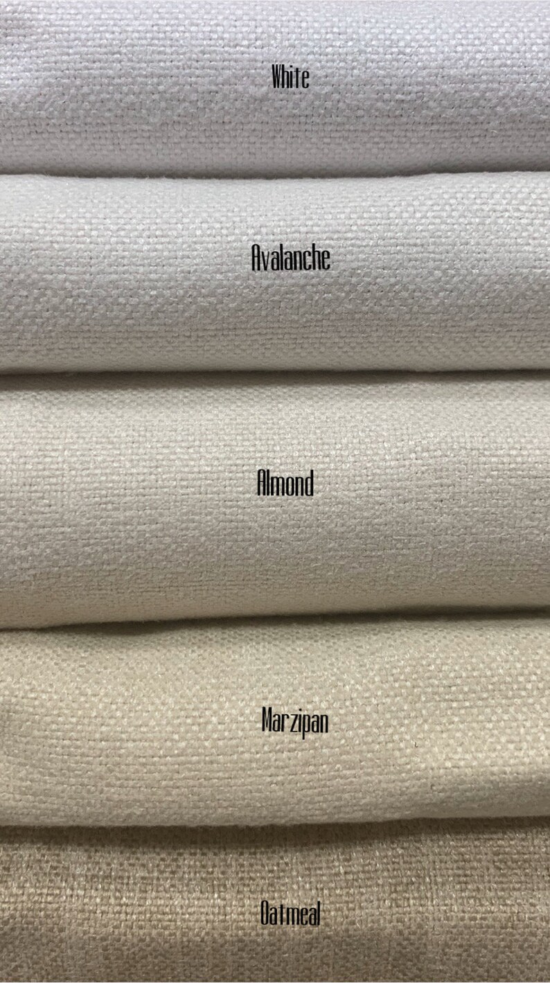 May include: Five fabric swatches in different shades of white and beige. The swatches are labeled from top to bottom: White, Avalanche, Almond, Marzipan, and Oatmeal.