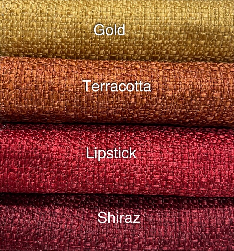 May include: Four fabric swatches in different shades of red and orange. The swatches are labeled "Gold", "Terracotta", "Lipstick", and "Shiraz".