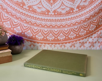 Libro vintage de jardinería con trepadoras
