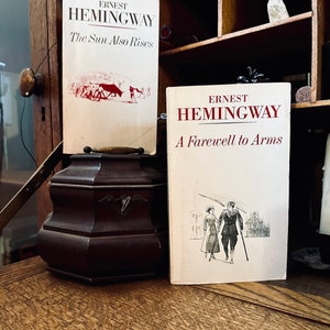 2 Undated Vintage Ernest Hemingway Paperbacks