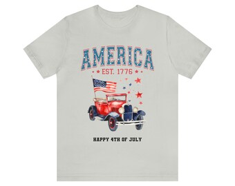 アメリカのダメージ加工Tシャツ、愛国的な赤いトラック、7月4日のシャツ。愛国心を披露する準備は万端! 独立記念日をスタイリッシュに祝いましょう。