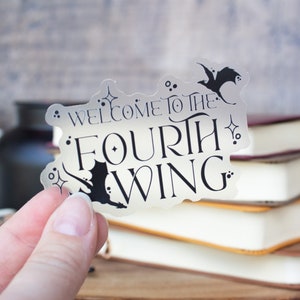 May include: A clear sticker with black text and a silhouette of a bat. The text reads "Welcome to the Fourth Wing".