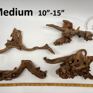 May include: Three pieces of brown driftwood, ranging in size from 10 to 15 inches. The driftwood is perfect for aquariums and terrariums.
