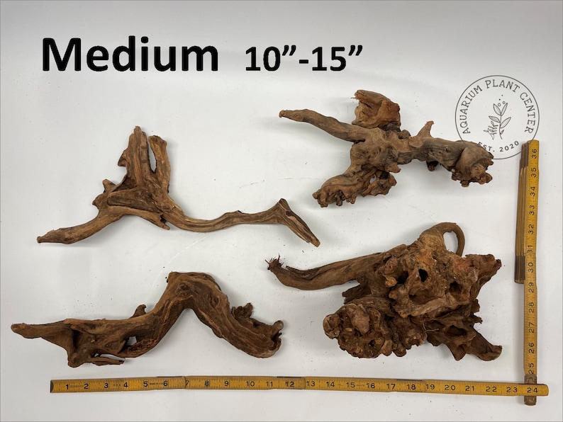 May include: Three pieces of brown driftwood, ranging in size from 10 to 15 inches. The driftwood is perfect for aquariums and terrariums.