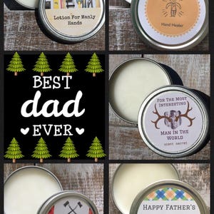 May include: Four different tin containers of hand balm with various designs. The containers are labelled with the text "Happy Father's Day", "World's Greatest Dad", "Best Dad Ever", and "Manly Hand Healer".