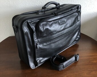 tumi leather luggage