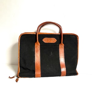 Cartera tipo maletín vintage de lona encerada fina y cuero