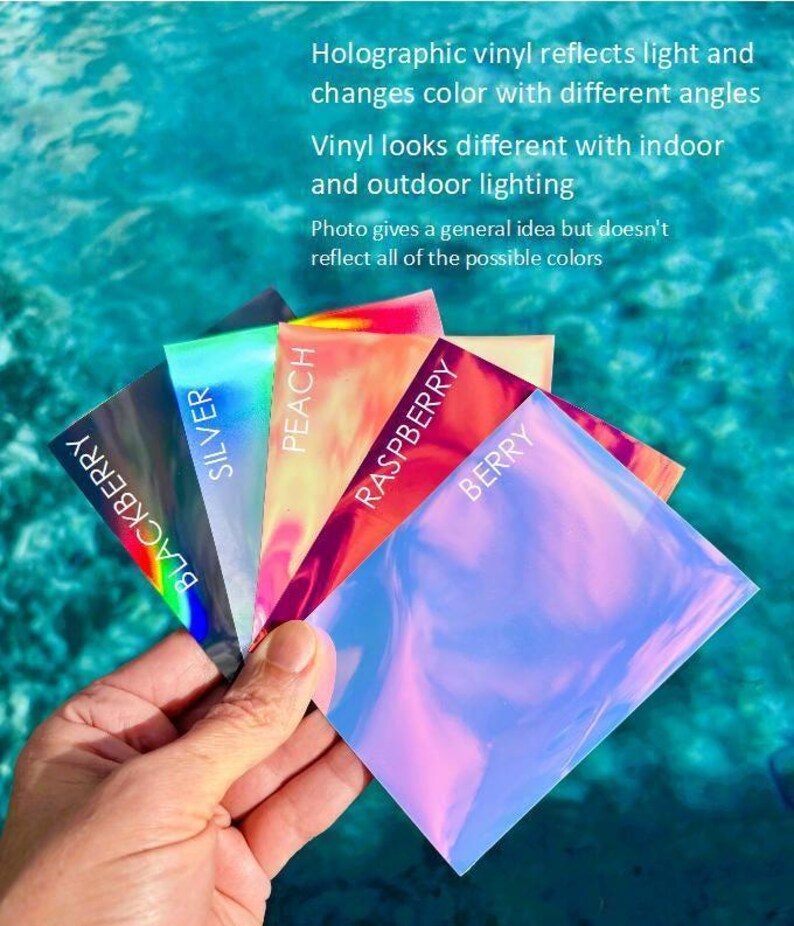 a person holding four different colored cards in their hand