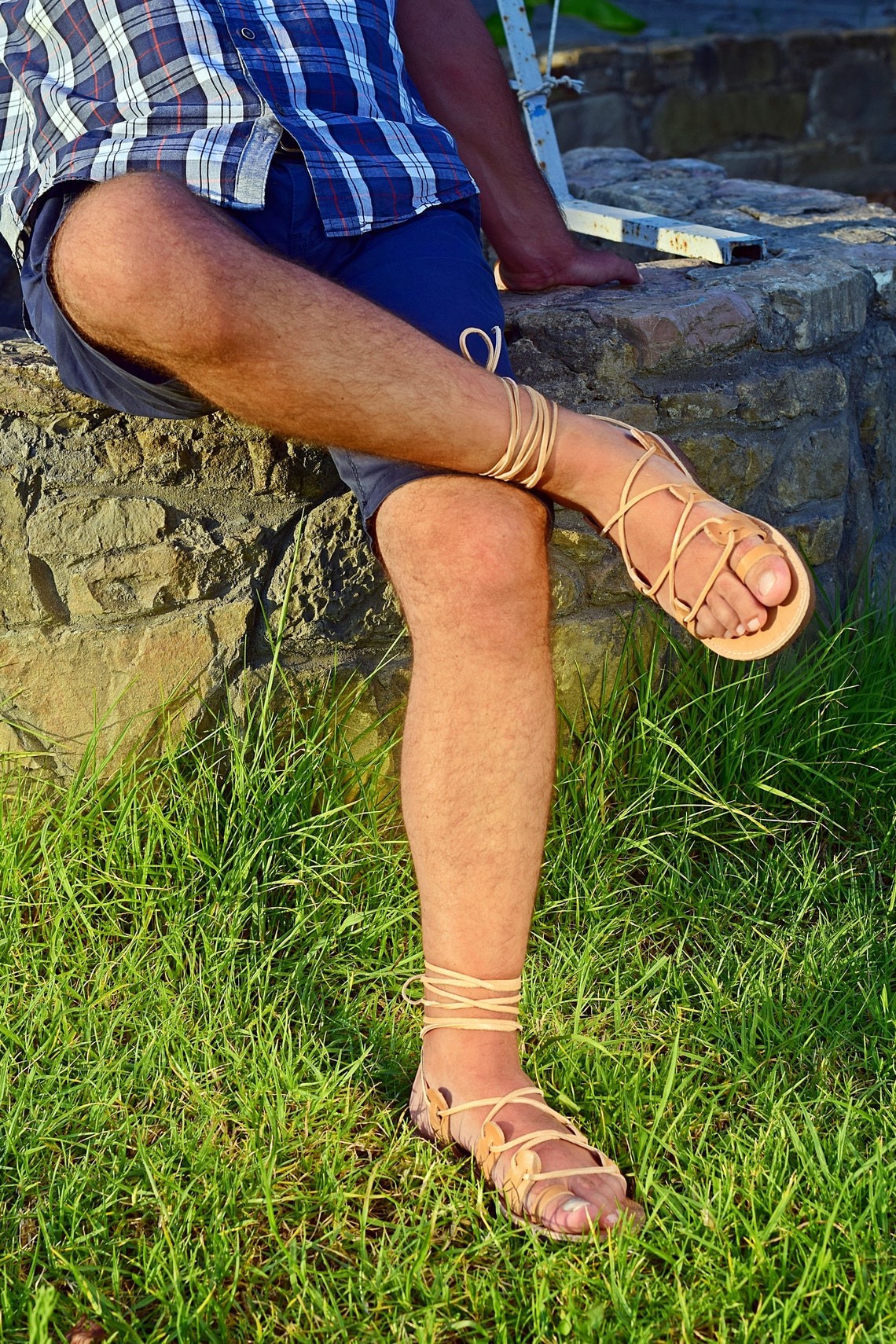 man wearing gladiator sandals