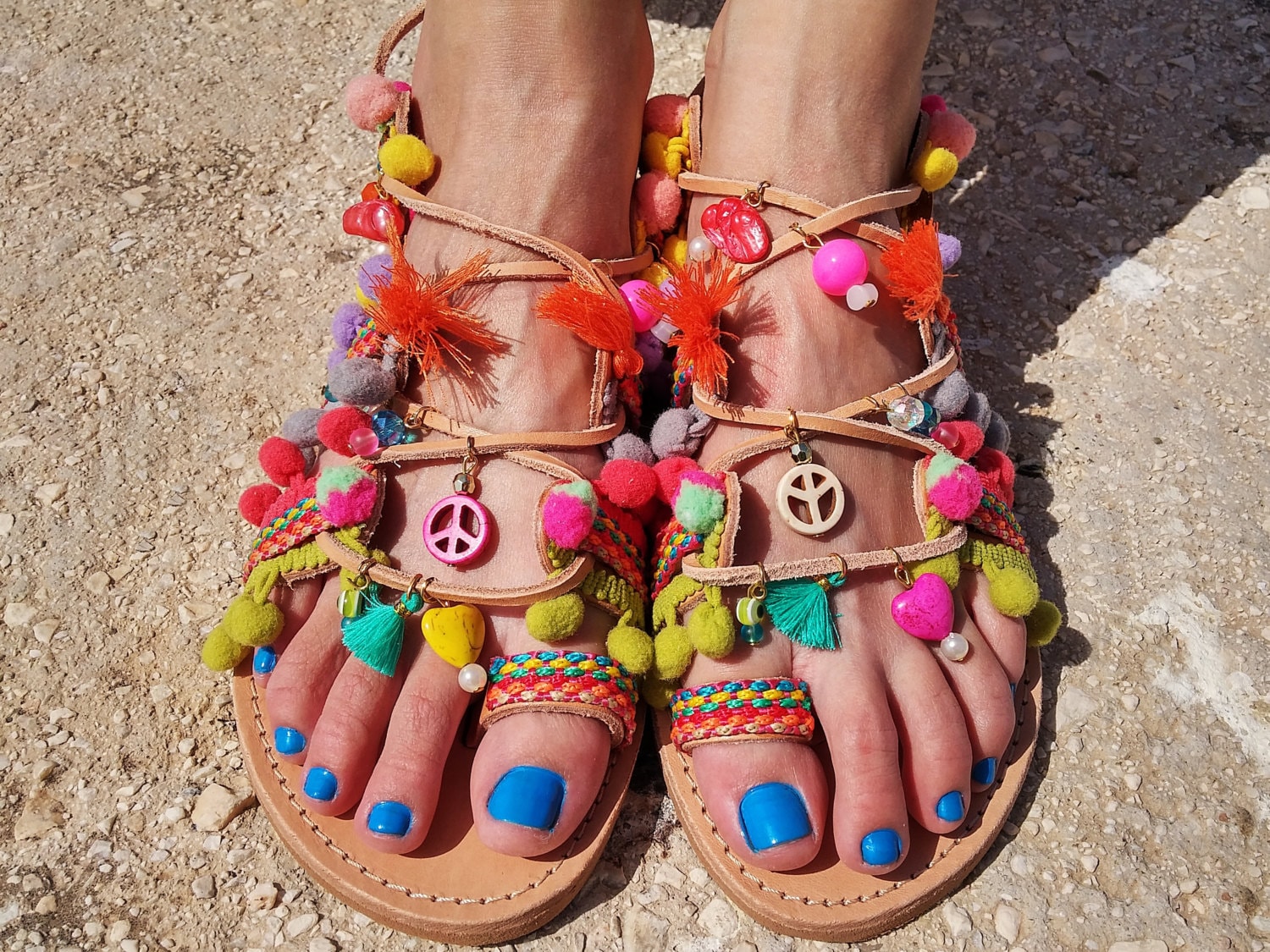 Slave sandals with pom best sale poms