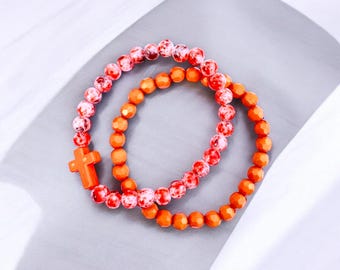 Orange cross beaded bracelet set. Each hand beaded.