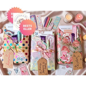 May include: Three gift-wrapped packages containing stationery and reading accessories. The left package has colourful dots, the centre has hearts, and the right has floral patterns. Each includes a reading list, pens, stickers, and a gift tag.