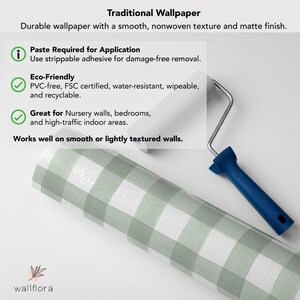 May include: Green and white gingham wallpaper roll with a roller brush. The wallpaper is described as durable, nonwoven, and matte. It is PVC-free, FSC certified, water-resistant, wipeable, and recyclable. It is also described as being great for nursery walls, bedrooms, and high-traffic indoor areas. The wallpaper works well on smooth or lightly textured walls.