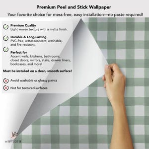May include: Green and white gingham peel and stick wallpaper. The wallpaper is shown being peeled off of a white surface. The text on the white surface reads: "Premium Peel and Stick Wallpaper", "Your favorite choice for mess-free, easy installation-no paste required!"  "Premium Quality", "Light woven texture with a matte finish.", "Durable & Long-Lasting", "PVC-free, water-resistant, washable, and fire-resistant.", "Perfect for", "Accent walls, kitchens, bathrooms, closet doors, mirrors, stairs, drawer liners, bookcases, and more!", "Must be installed on a clean, smooth surface!", "Avoid washable or glossy paints", "Not for textured surfaces".