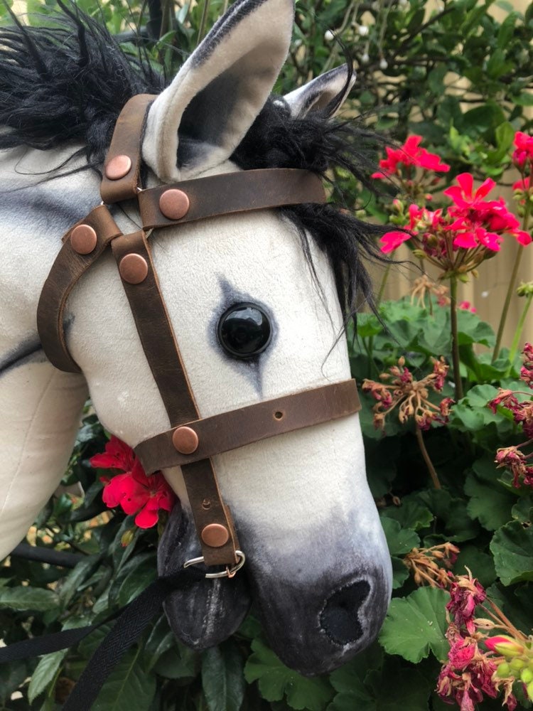 black stick horse