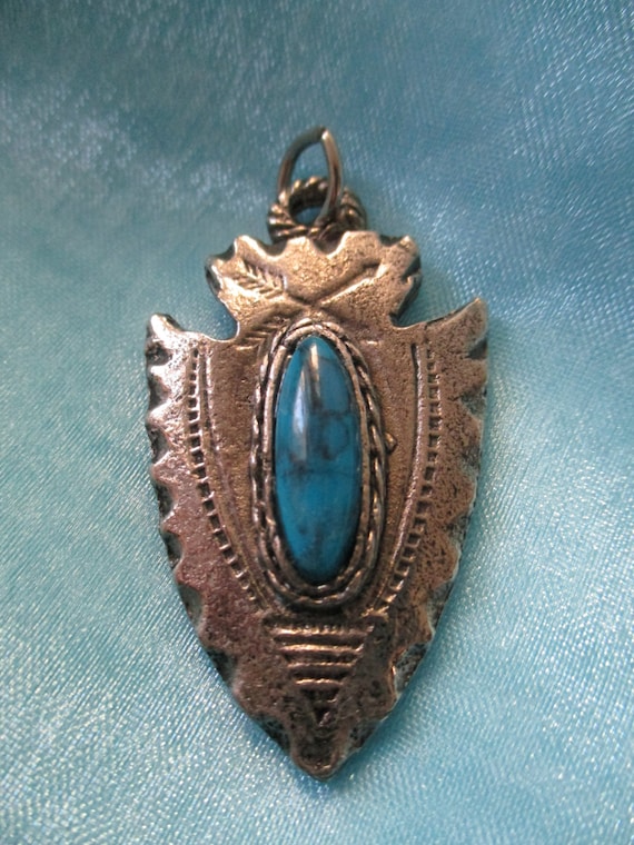 Manufactured Turquoise and Silver Toned Pendant