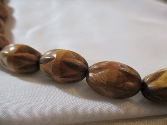 Varied Shades of Brown Carved Kukui Nut Necklace - image 3