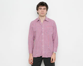 Checked gingham plaid pattern men's shirt . Retro grunge red white blue long sleeved button down oxford classic shirt .