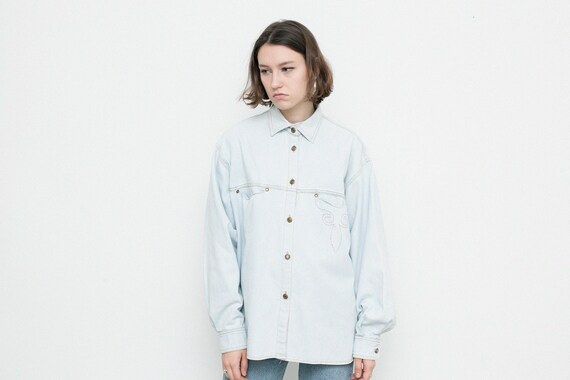 light blue denim button up shirt