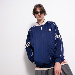 light blue adidas track jacket