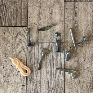 2008 Clue Discover the Secrets Game Replacement Pieces- 9 Weapons- Clue Weapons, Clue Pieces