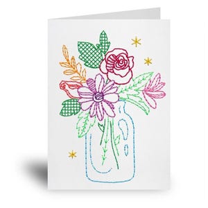 a card with a floral arrangement in a glass vase, which is embroidered with colorful flowers and leaves.