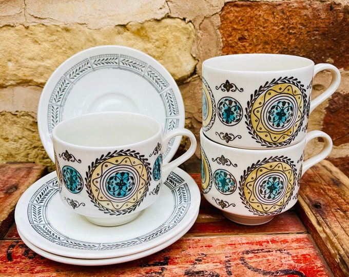 Kathie Winkle Carousel Teacups and Saucers for Broadhurst Pottery - in 1970s Blue and Yellow Rosette Design