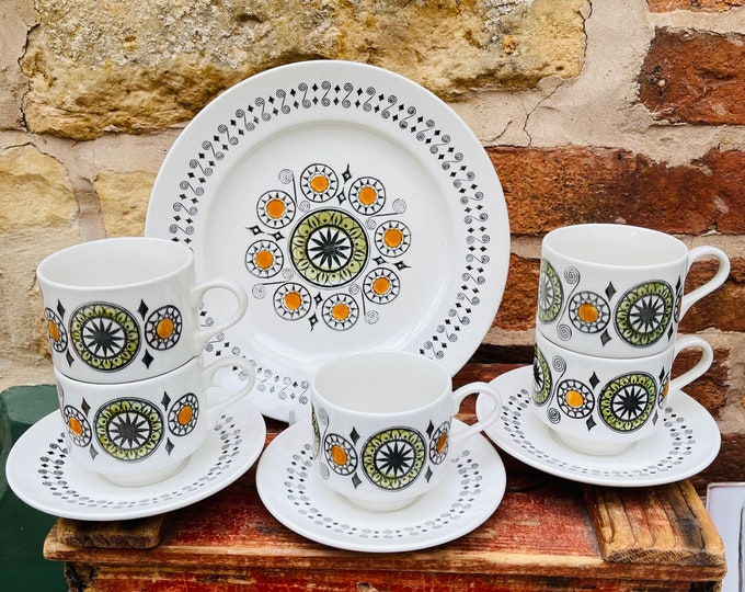 Kathie Winkle Renaissance Plates, Teacups and Saucers for Broadhurst Pottery - in 1970s Orange and Green Spiral Design