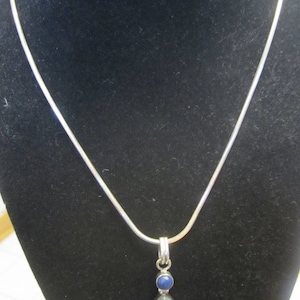 Vintage 925 Sterling 925 Genuine Lapis Pendant Approximately 2 1/4 inches long Weighs 8 grams