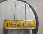 1940 39 s yellow Pepsi drink holder