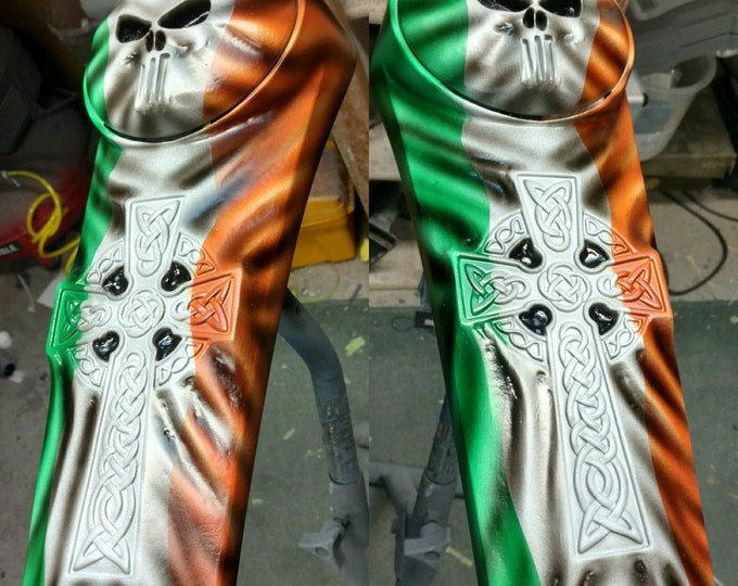 3D punisher and knotted Celtic cross stretching through Harley Davidson fuel console