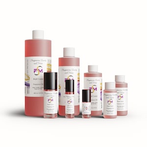 May include: A collection of pink fragrance oil bottles and roll-ons. The bottles vary in size and have white caps. The labels read "Bright Crystal Fragrance Oil" and "Fragrances, Scents and More".