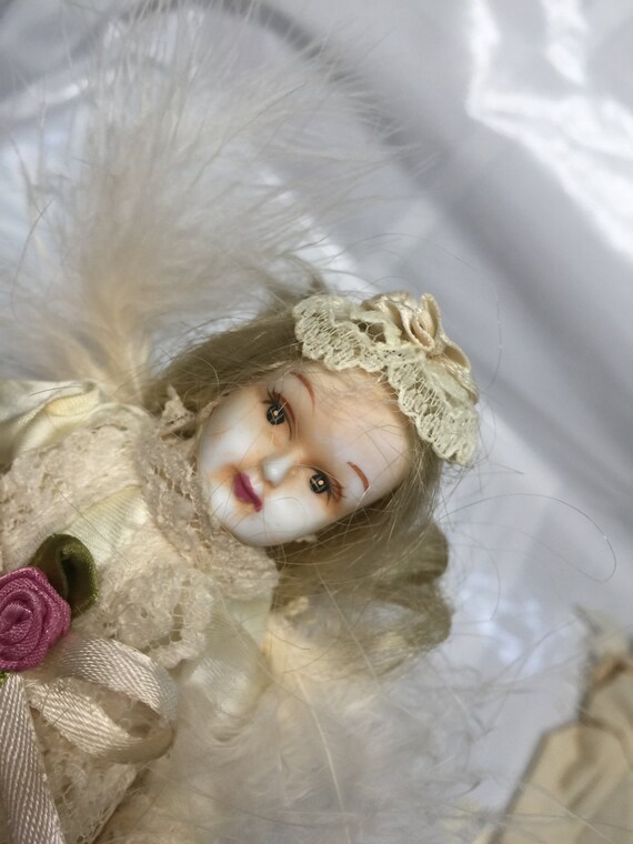 white porcelain doll
