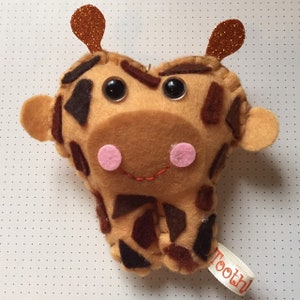 Giraffe tooth fairy pillow. hand embroidered, personalised and made in Sydney Australia