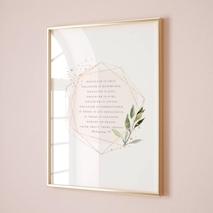 May include: A gold geometric frame with a watercolor floral design and a quote from Philippians 4:8: "Whatever is true, whatever is honorable, whatever is just, whatever is pure, whatever is lovely, whatever is commendable, if there is any excellence, if there is anything worthy of praise, think about these things."