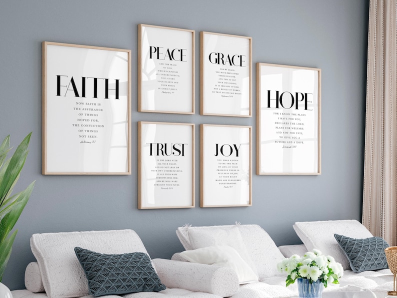May include: Six framed prints with white backgrounds and black text. The prints feature the words "Faith", "Peace", "Grace", "Hope", "Trust", and "Joy" with bible verses underneath each word.