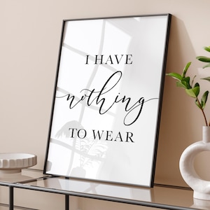 Puede incluir: Una impresión de arte de pared imprimible en blanco y negro con el texto "Tengo nada que ponerme" en una fuente cursiva.