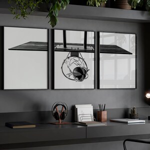 May include: A triptych wall art set featuring a black and white photograph of a basketball hoop and backboard. The central panel displays the hoop with a net and a basketball, while the two side panels show the extended backboard structure.